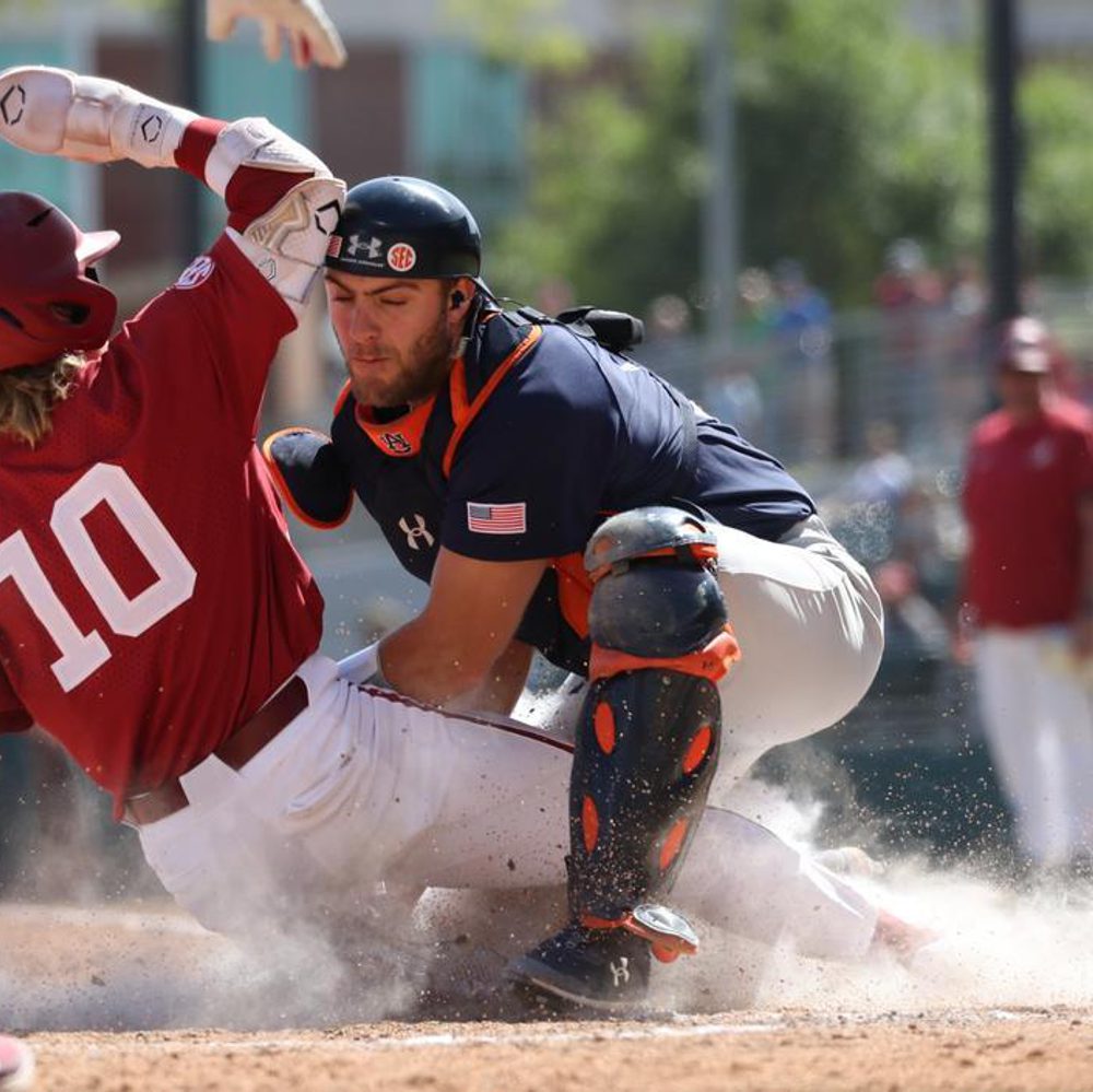 Alabama baseball player Jim Jarvis (10) steals home against Auburn at Sewell-Thomas Stadium in Tuscaloosa, Alabama on Sunday, Apr 16, 2023. Alabama News
