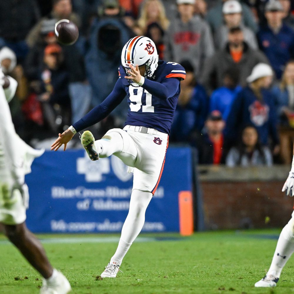 Oscar Chapman (91) punts the ball during the football game between the Texas A&M Aggies and the Auburn Tigers at Jordan Hare Stadium in Auburn, AL on Saturday, Nov 12, 2022. Todd Van Emst/Auburn Tigers Alabama News