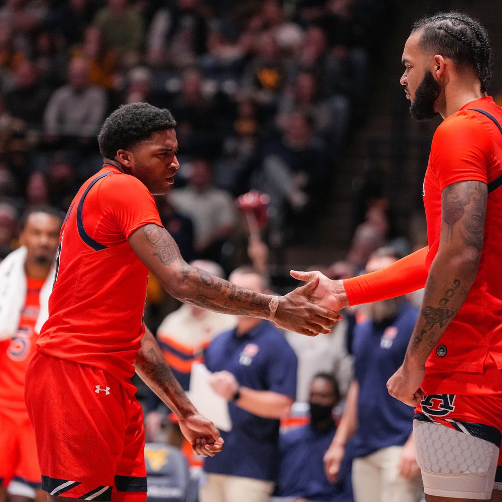 K.D. Johnson (0) and Johni Broome (4) during the game between the West Virginia Mountaineers and the #15 Auburn Tigers at WVU Coliseum in Morgantown, WV on Saturday, Jan 28, 2023. Steven Leonard/Auburn Tigers Alabama News