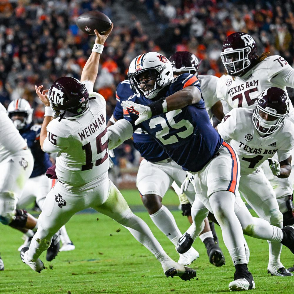 November 12, 2022; Auburn, Al, USA; Colby Wooden (25) forces the quarterback to throw off balance during the game between Auburn and Texas A&M at Jordan-Hare Stadium. Todd Van Emst/AU Athletics Alabama News