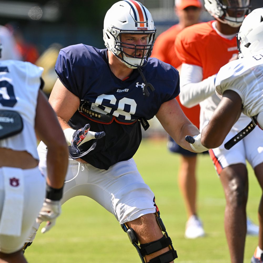 Austin Troxell (68), Eku Leota (55), Colby Wooden (25) Auburn football practice Tue. Aug. 16, 2022 in Auburn, Ala. Alabama News
