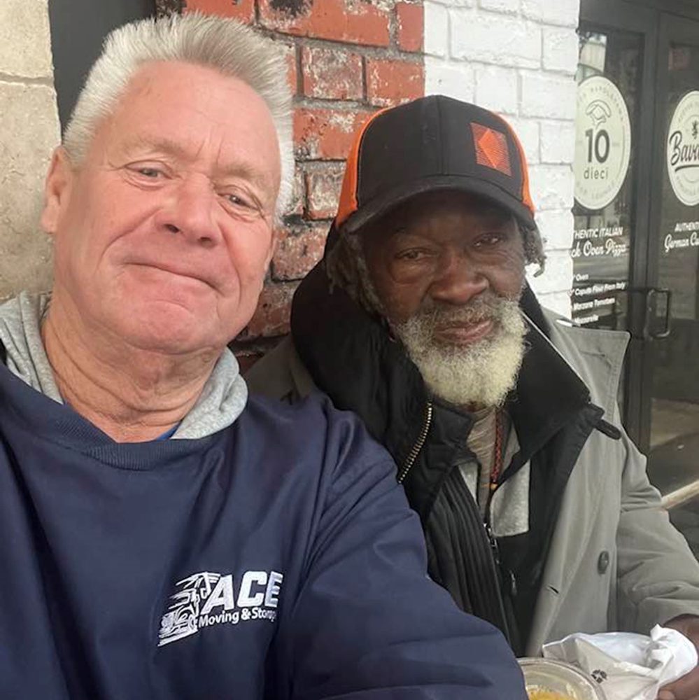 Stephen Nodine, left, with homeless man, “Robert”. Photo: Nodine Facebook Alabama News