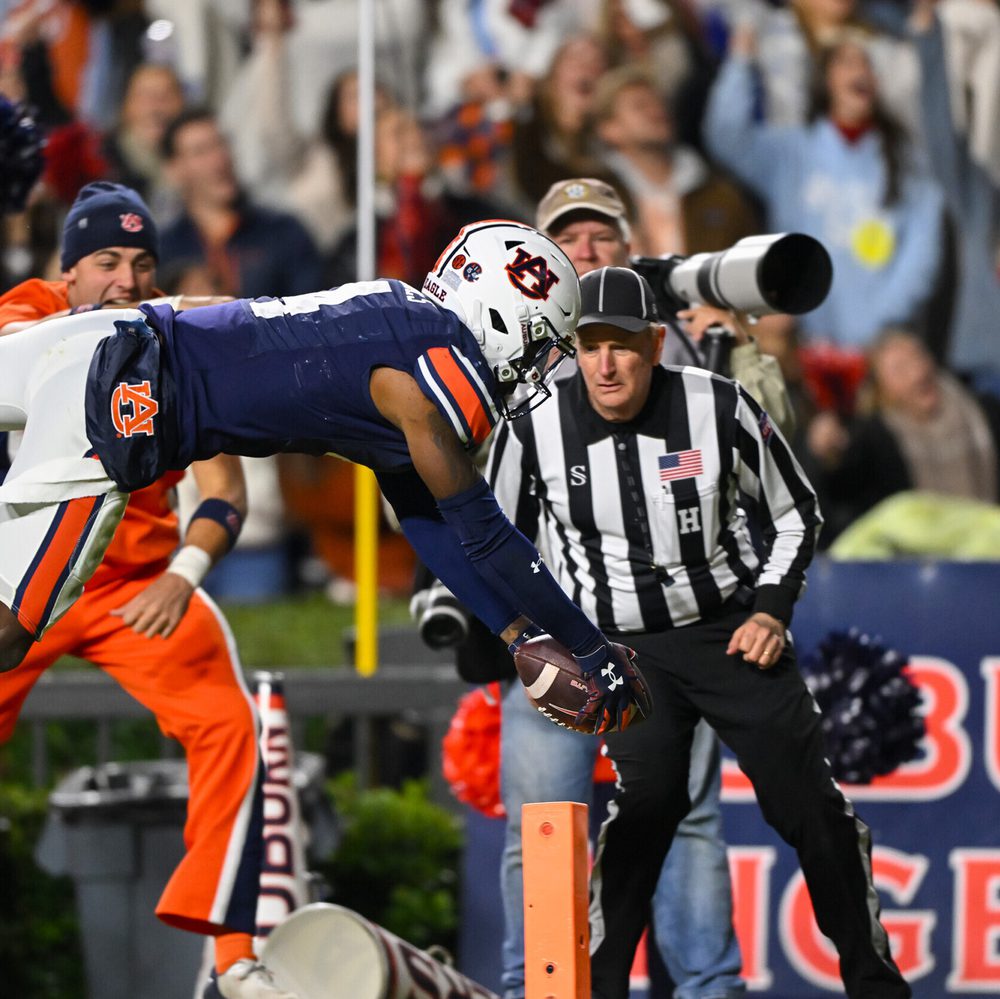 Nov 19, 2022; Auburn, AL, USA; D.J. James (4) scores a touchdown during the game between Auburn and Western Kentucky at Jordan Hare Stadium. Todd Van Emst / AU Athletics Alabama News