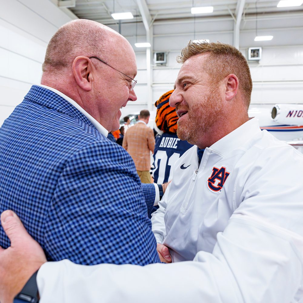 Auburn resident Dr. Chris Roberts and Auburn Head Football Coach Alex Golesh Alabama News