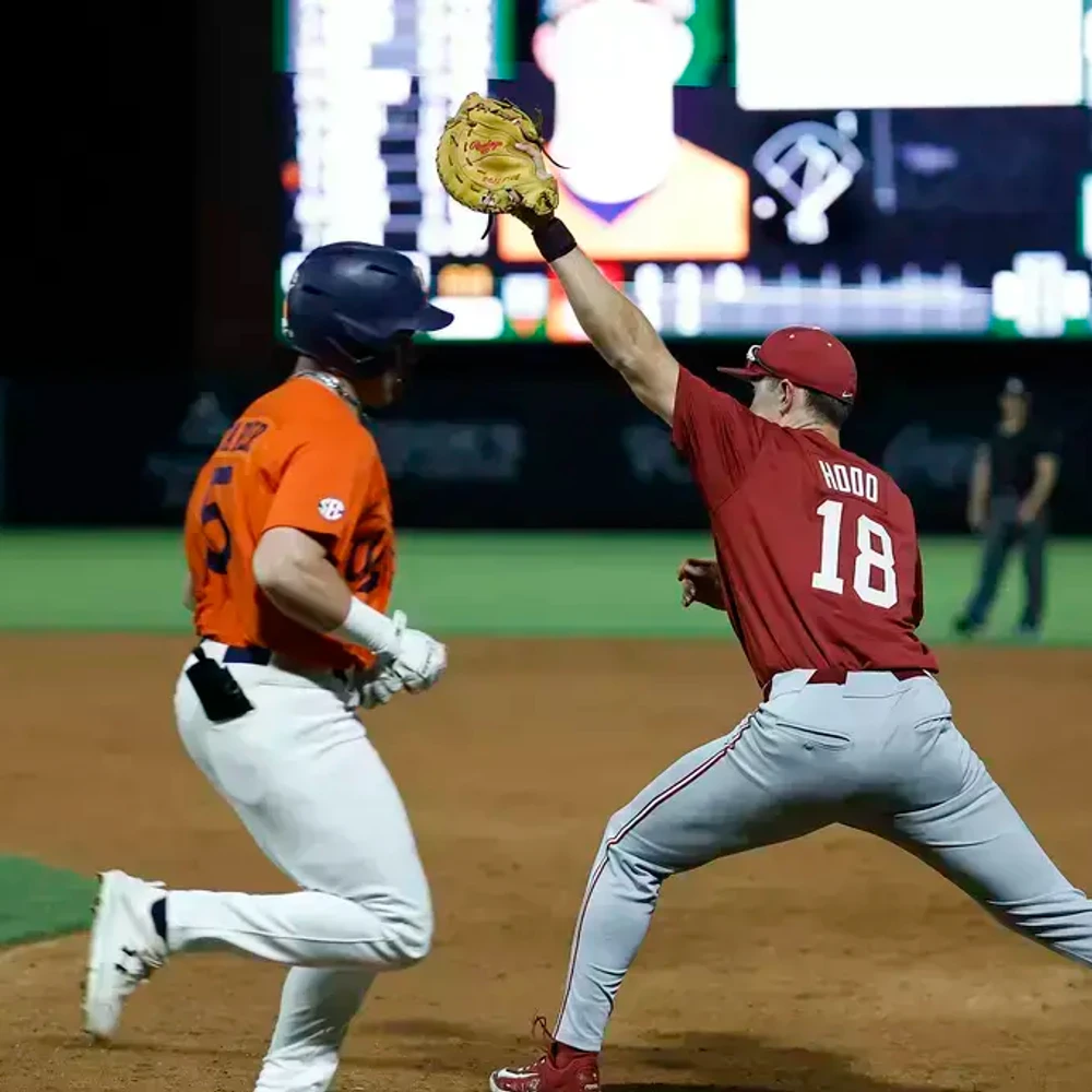 Alabama Baseball Player Will Hodo (18) makes a play at 1st base against Auburn at Plainsman Park in Auburn, AL on Saturday, Apr 5, 2025. Photo by Crimson Tide Photos / UA Athletics Alabama News