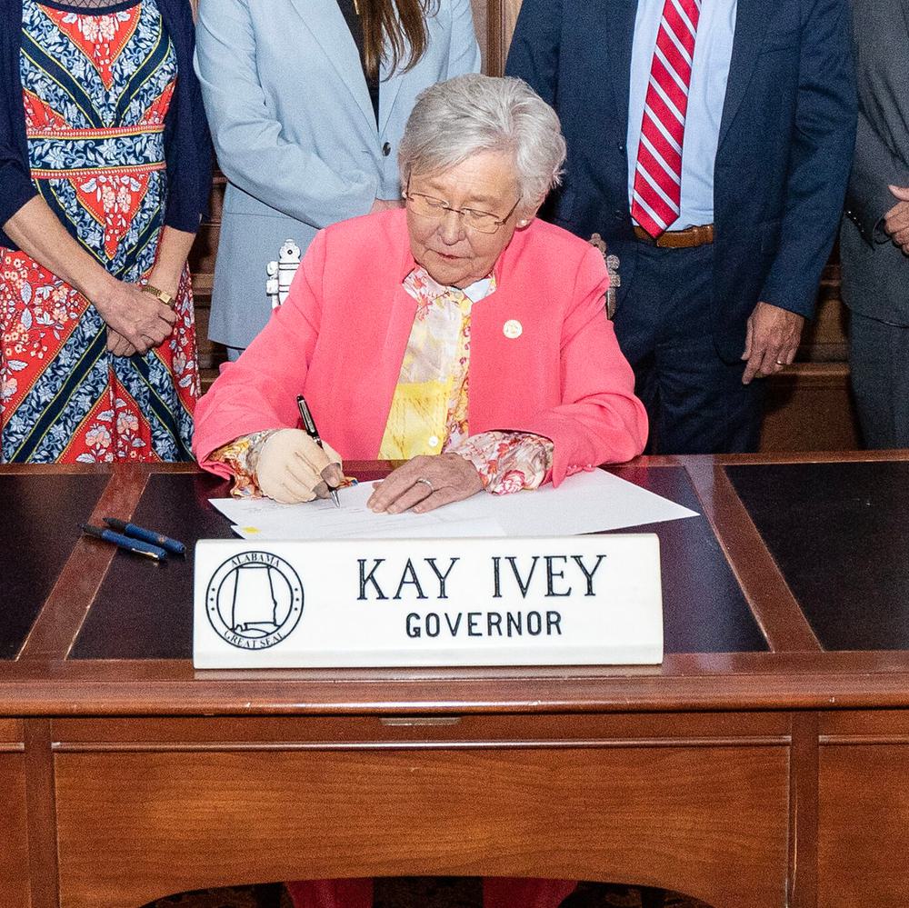 Kay Ivey signs Alabama News