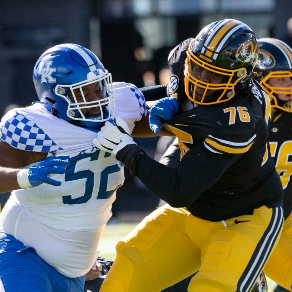 Kentucky defensive lineman Justin Rogers, left, fights his way past Missouri’s Javon Foster, right, during a game Saturday, Nov. 5, 2022, in Columbia, Mo. L.G. Patterson Alabama News