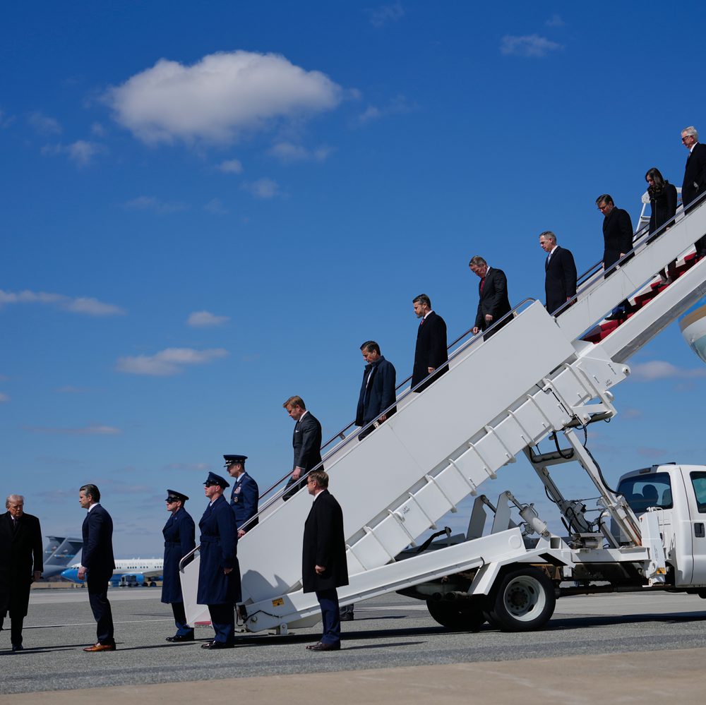 President Donald Trump arrives with Defense Secretary Pete Hegseth, Chairman of the Joint Chiefs of Staff Gen. Dan Caine and members of Congress, on Air Force One, Wednesday, March 18, 2026, at Dover Air Force Base, Del., to attend the casualty return for Alabama News