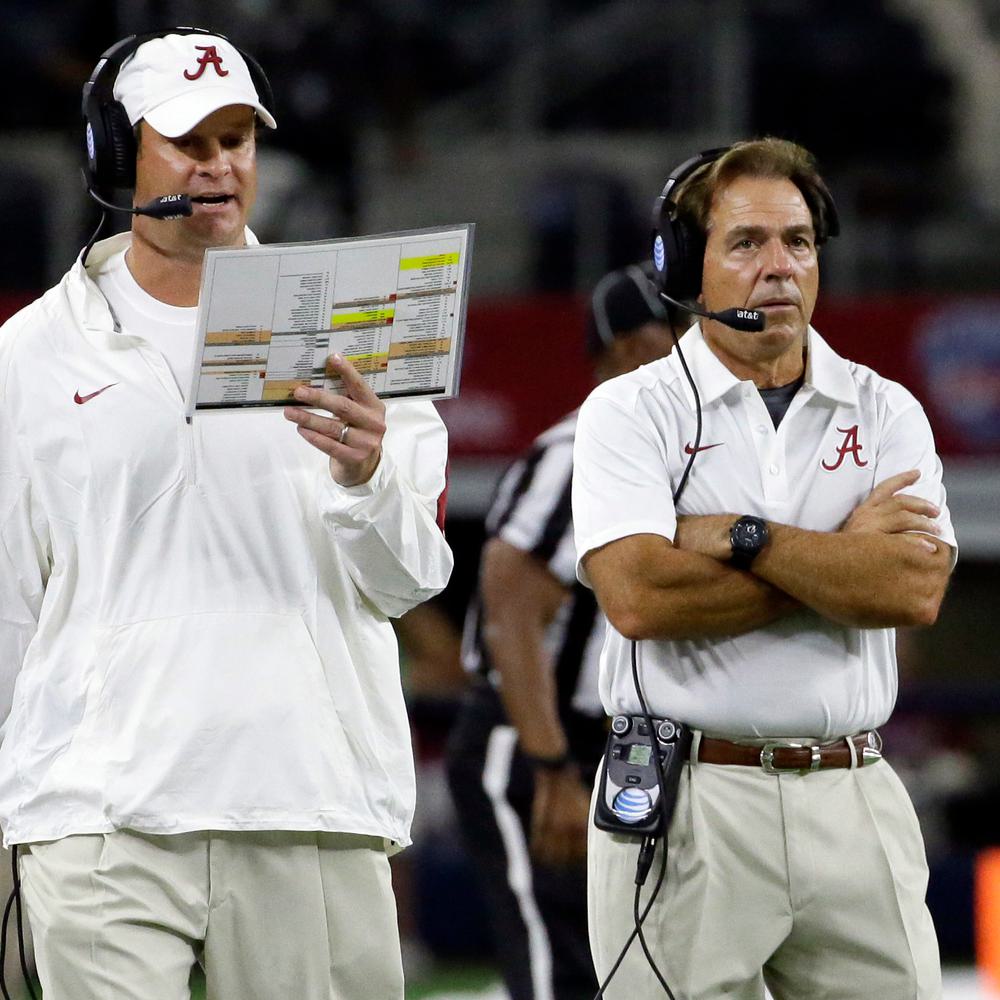 Alabama head coach Nick Saban, right, looks on as offensive coordinator Lane Kiffin calls a play on the sidelines Alabama News