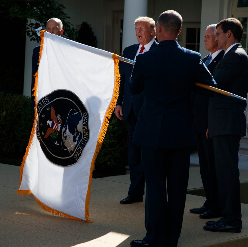 President Donald Trump watches as the flag of the new U.S. Space Command is presented during a ceremony for the establishment of the command in the Rose Garden of the White House, Thursday, Aug. 29, 2019, in Washington. (AP Photo/Evan Vucci) Alabama News