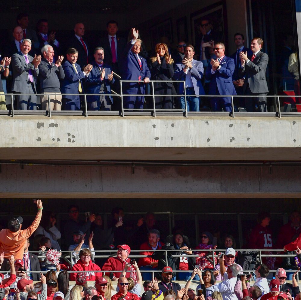 President Donald Trump waves alongside first lady Melania Trump as the Alabama and LSU fans cheer their introduction in the first half of an NCAA football game Saturday, Nov. 9, 2019, in Tuscaloosa, Ala. (AP Photo/Vasha Hunt) Alabama News