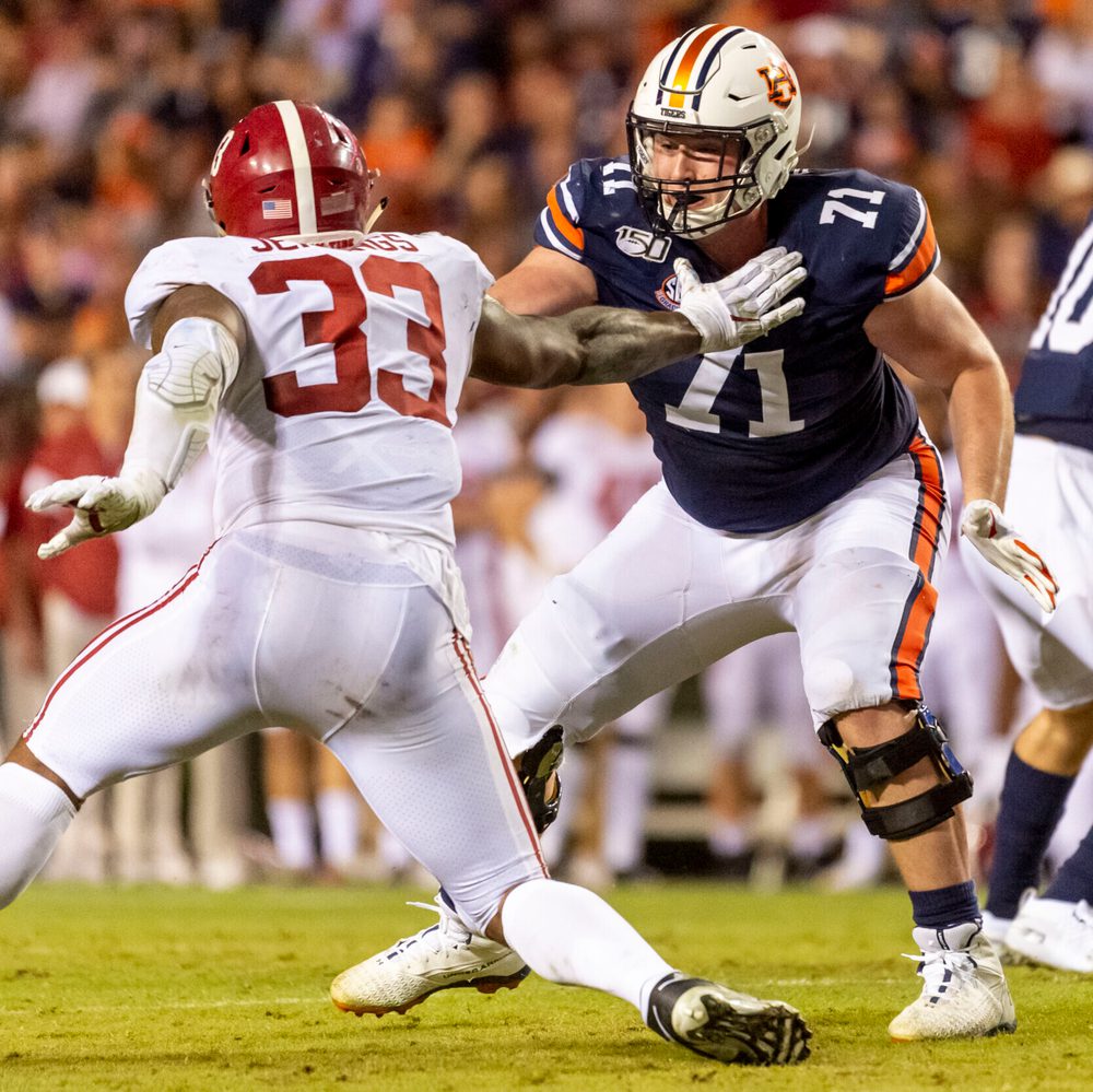 Auburn offensive lineman Jack Driscoll (71) blocks against Alabama linebacker Anfernee Jennings (33) Alabama News