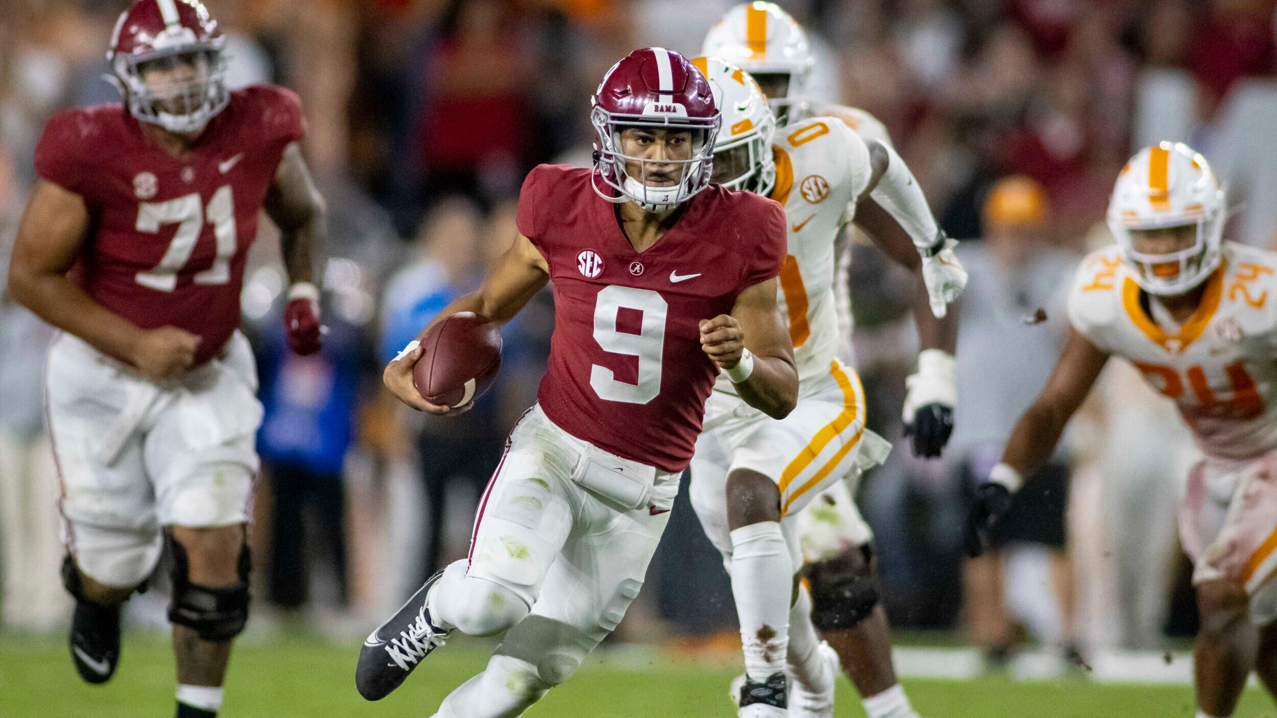Alabama quarterback Bryce Young (9) runs the ball during the second half of an NCAA college football game against Tennessee, Saturday, Oct. 23, 2021, in Tuscaloosa, Ala.