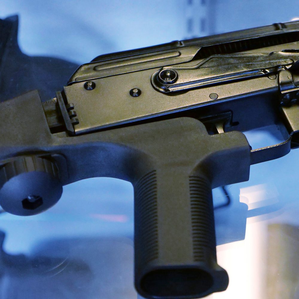 FILE - A bump stock is attached to a semi-automatic rifle Alabama News