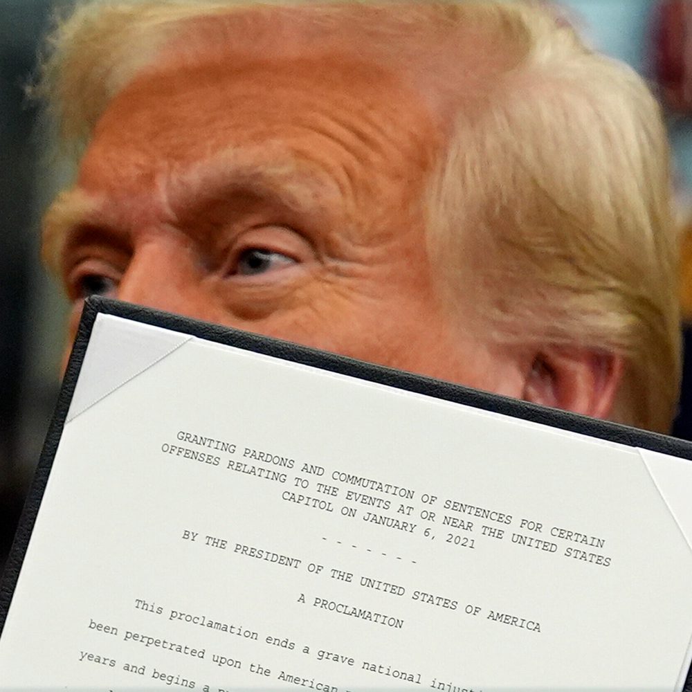 President Donald Trump signs an executive order pardoning about 1,500 defendants charged in the Jan. 6 attack on the U.S. Capitol in the Oval Office of the White House, Monday, Jan. 20, 2025, in Washington. Alabama News
