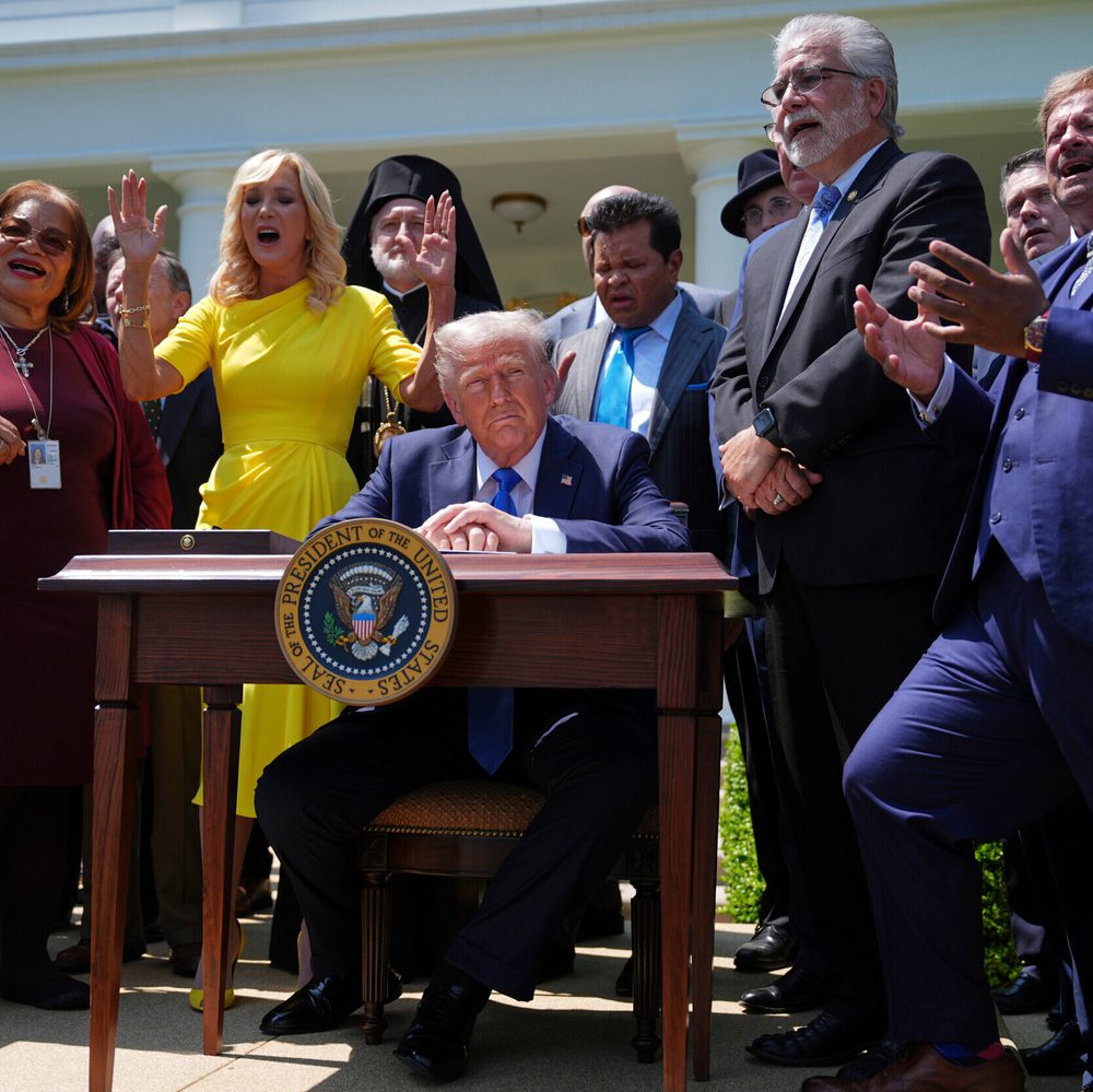 President Donald Trump sits at a desk as he and other religious leaders listen to a musical performance before Trump signs an executive order during a National Day of Prayer event in the Rose Garden of the White House, Thursday, May 1, 2025, in Washington Alabama News