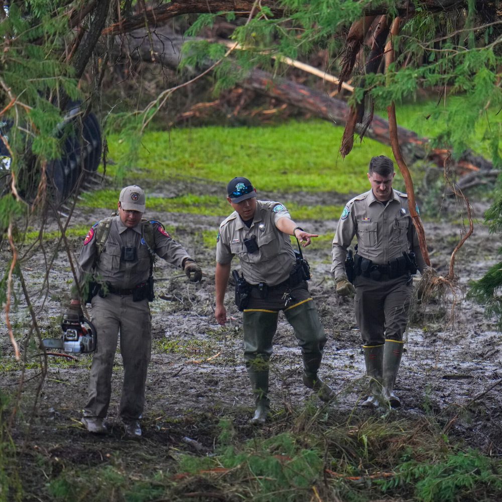 Officials inspect an area at Camp Mystic along the banks of the Guadalupe River after a flash flood swept through the area Sunday, July 6, 2025, in Hunt, Texas. (AP Photo/Julio Cortez) Alabama News