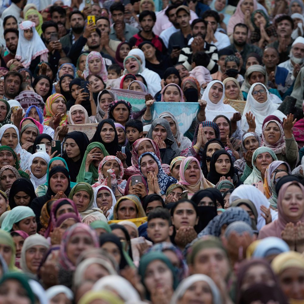 Kashmiri Muslim devotees pray as a head priest displays a relic, believed to be a hair from the beard of the Prophet Muhammad, at the Hazratbal shrine on Eid-e-Milad, the birth anniversary of the prophet, in Srinagar, Indian controlled Kashmir, Saturday, Alabama News