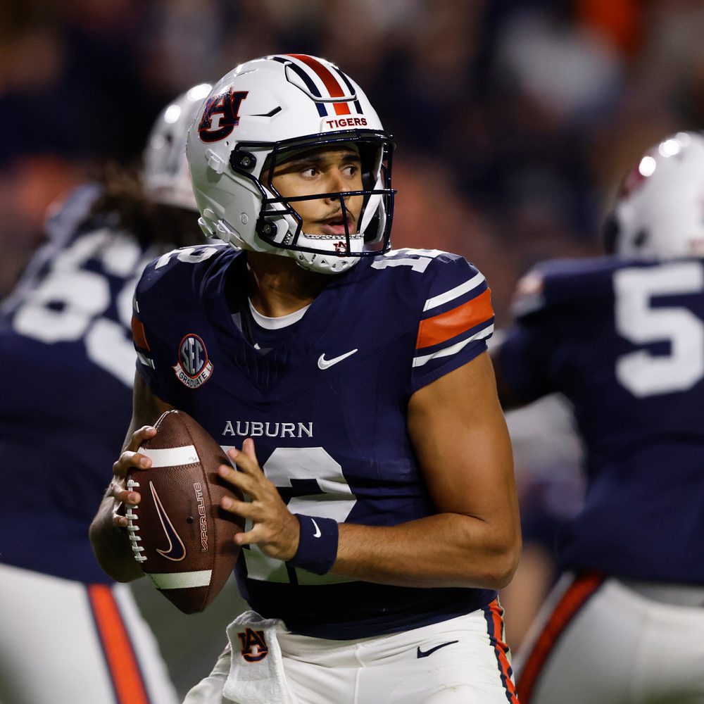 Auburn quarterback Ashton Daniels (12) throws a pass during the first half of an NCAA college football game against Kentucky, Saturday, Nov. 1, 2025, in Auburn, Ala. (AP Photo/Butch Dill) Alabama News