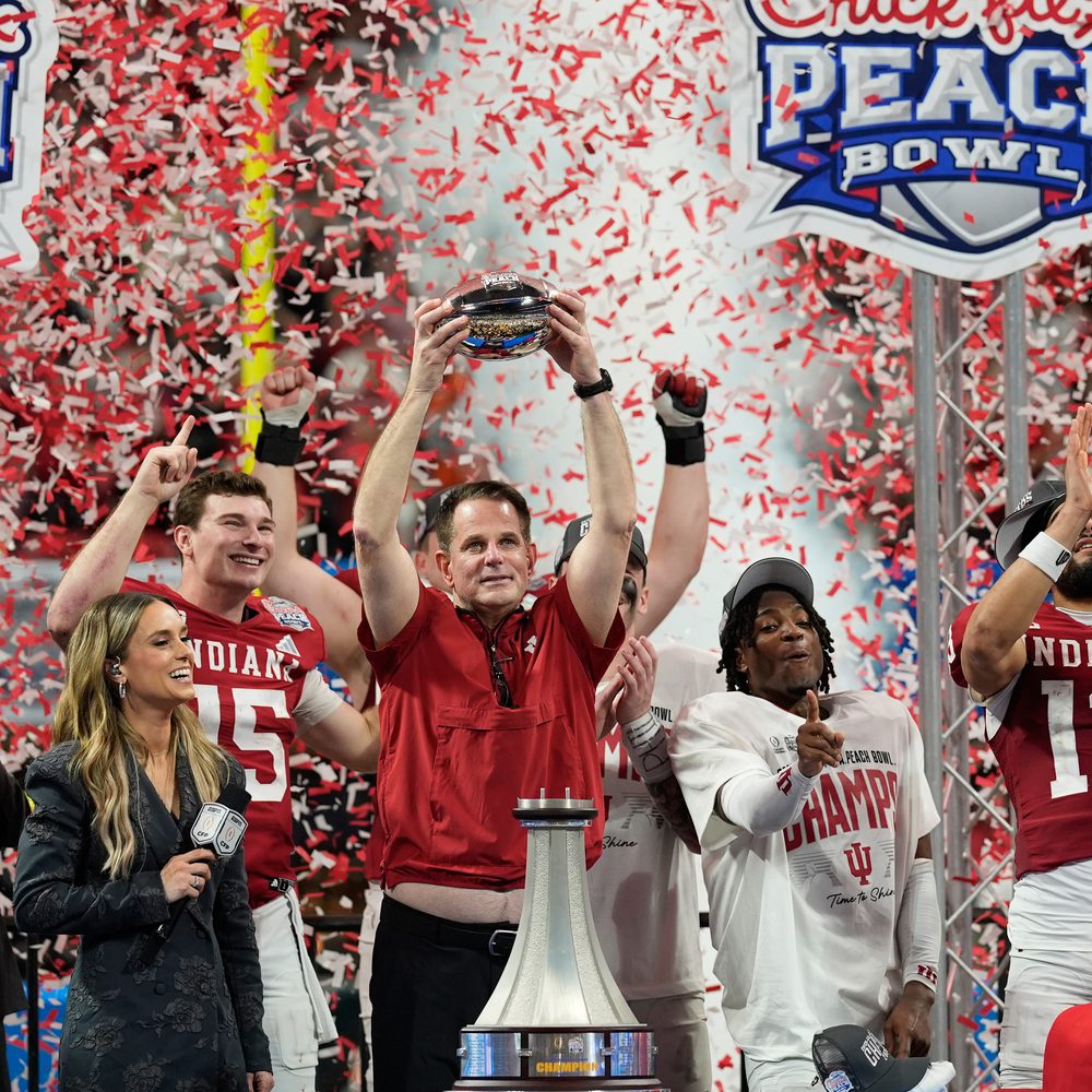 Indiana head coach Curt Cignetti holds up the trophy after the Peach Bowl NCAA college football playoff semifinal against Oregon, Friday, Jan. 9, 2026, in Atlanta. (AP Photo/Mike Stewart) Alabama News