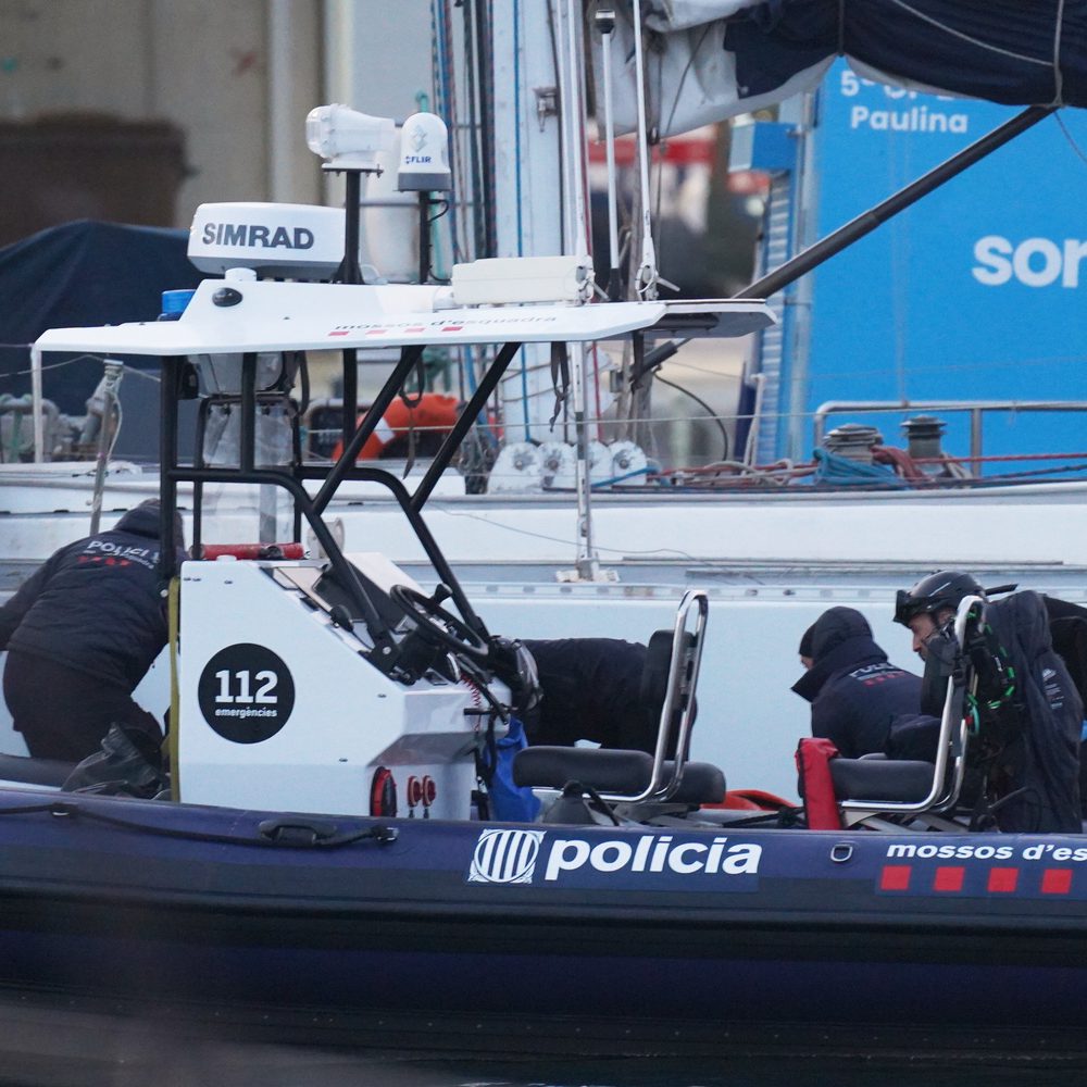 olice officers recover the body of a person found in the waters off the Port of Barcelona, Spain, Thursday, March 19, 2026. (AP Photo/Alfonso Beato) Alabama News