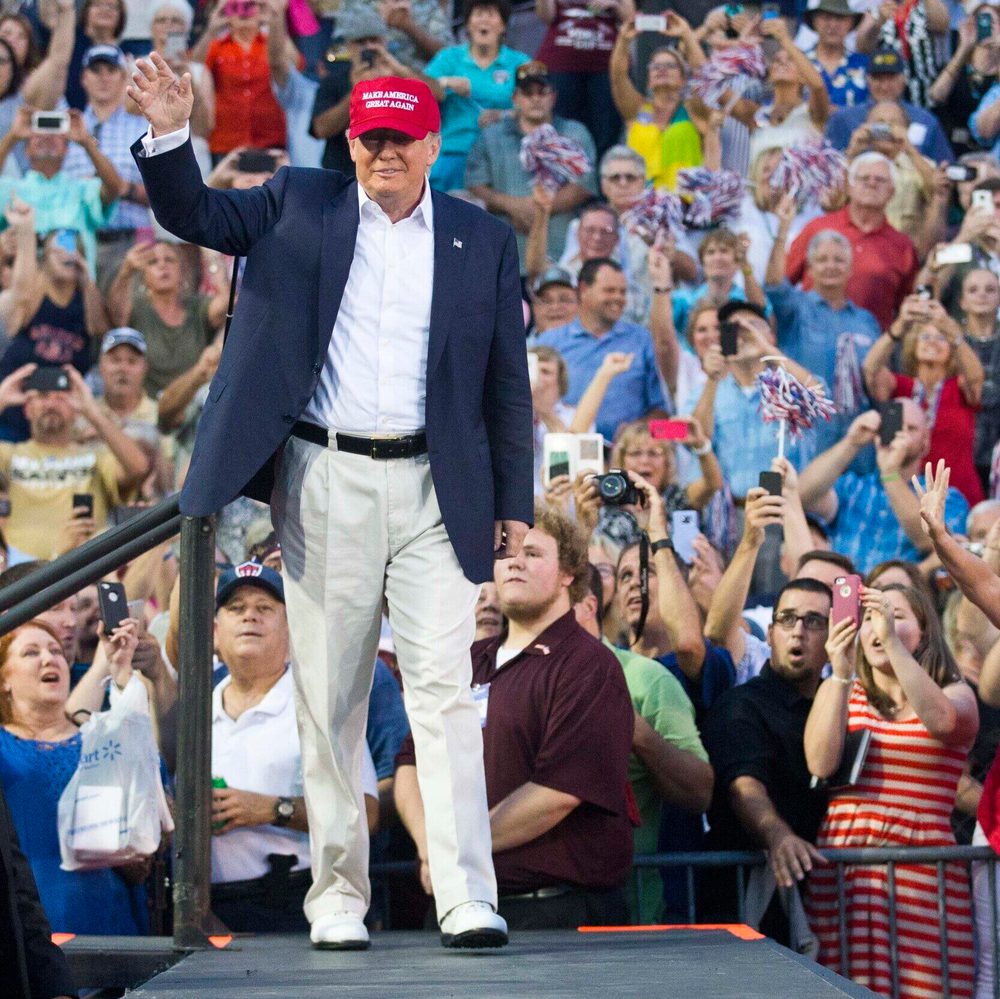 Republican presidential candidate Donald Trump waves to supporters during a campaign rally in Mobile, Ala., on Friday, Aug. 21, 2015. (AP Photo/Brynn Anderson) Alabama News