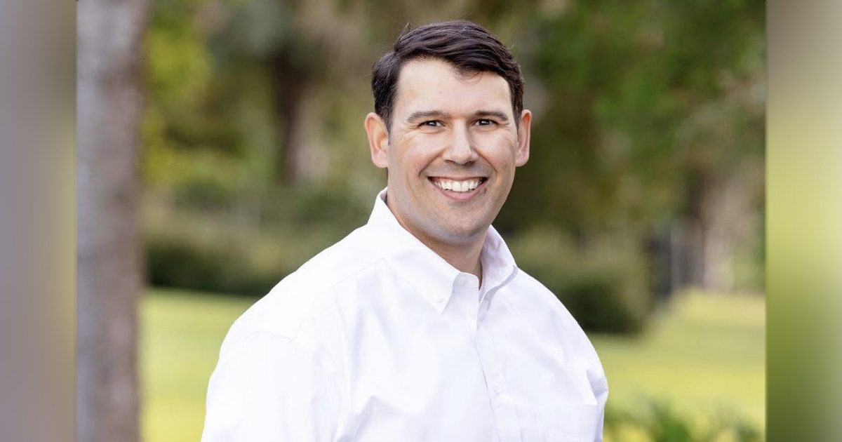 U.S. veteran, small business owner Austin Sidwell shifts with…