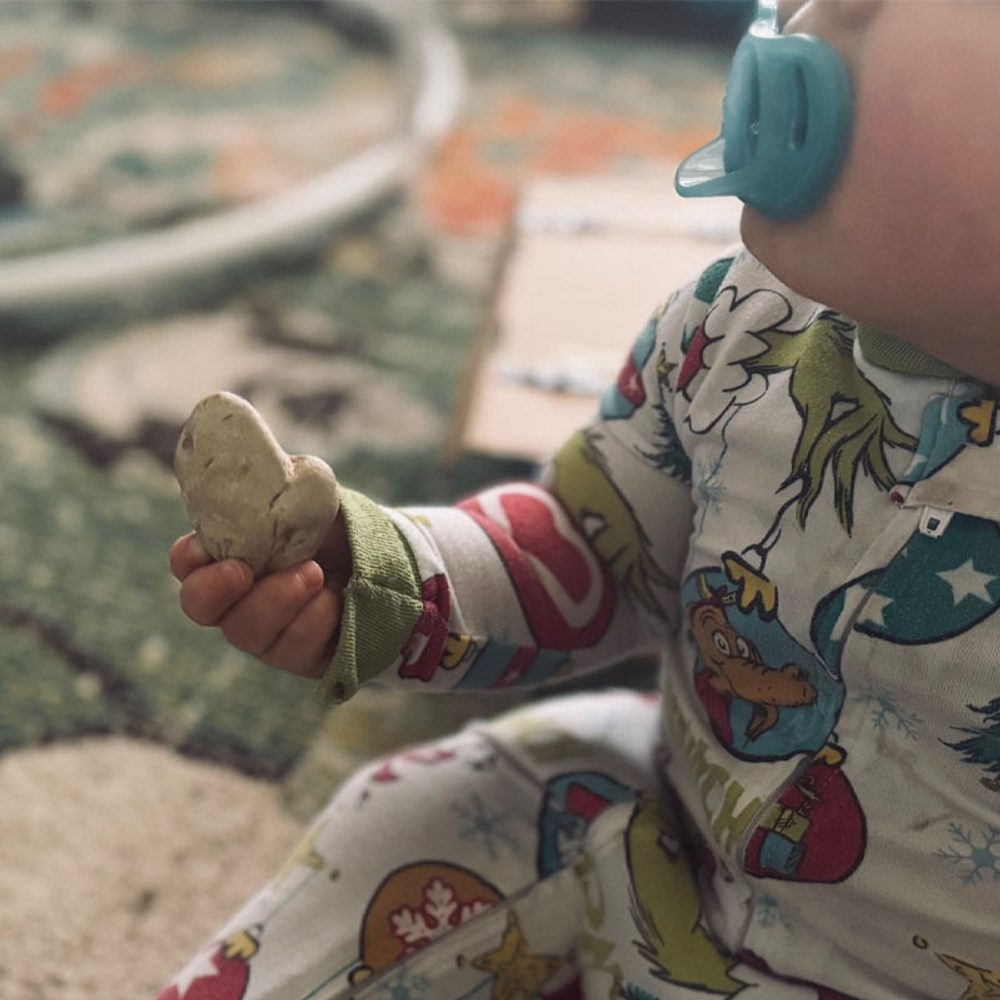 Baby Sam holding the stone Alabama News