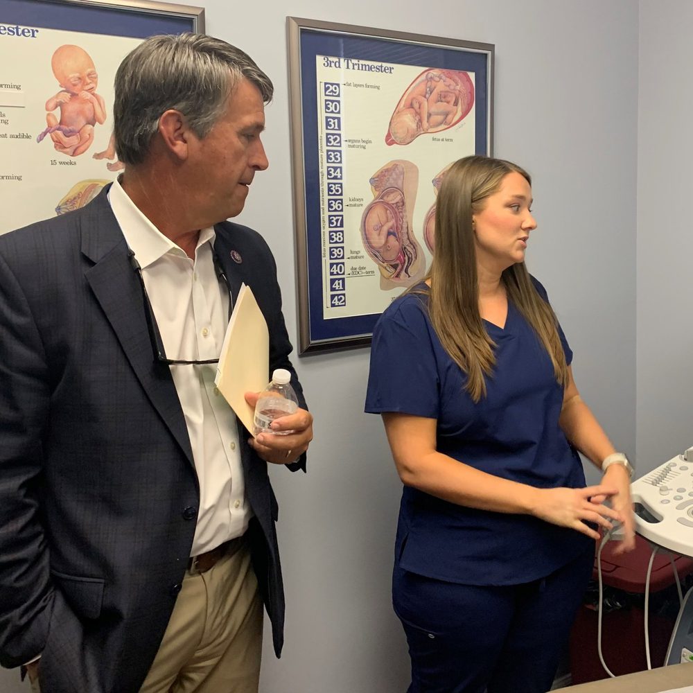 Barry Moore inspecting an ultrasound machine Alabama News