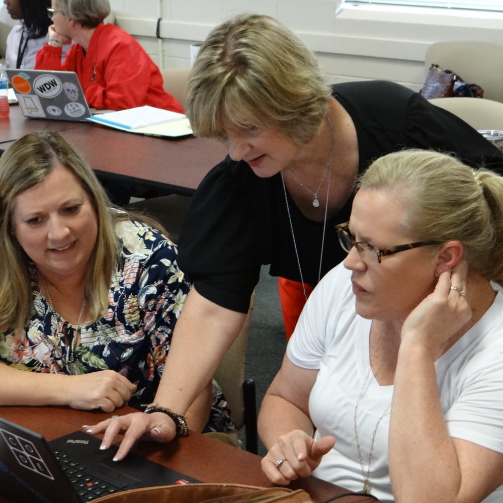 Michele Collier instructs Connie Reeves from the Central Office (left) and Janet Brantley from Flomaton Elementary (right) Alabama News