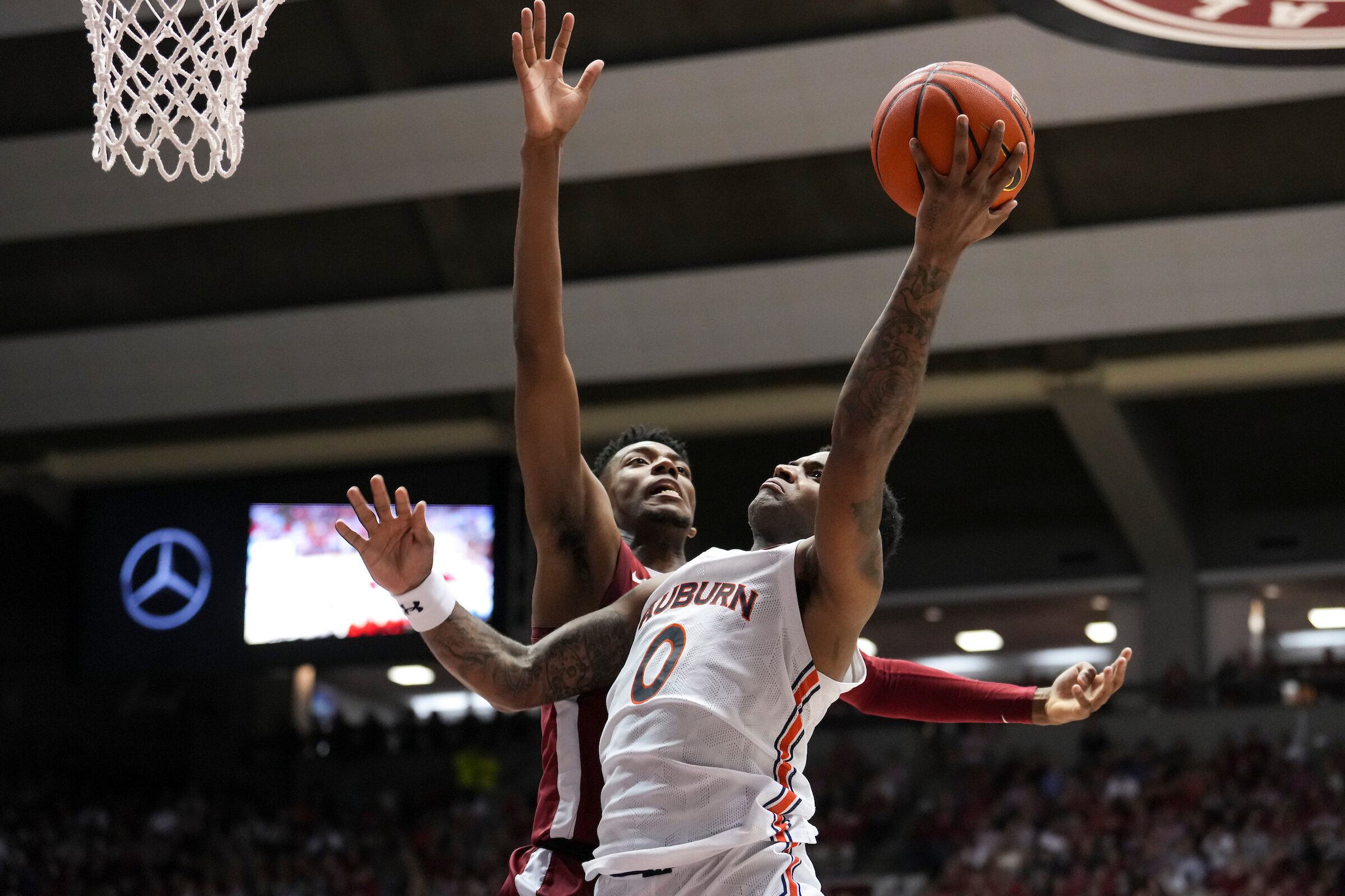 K.D. Johnson (0) during the game between the Alabama Crimson Tide and the Auburn Tigers at Coleman Coliseum in Tuscaloosa, AL on Wednesday, Mar 1, 2023. Steven Leonard/Auburn Tigers