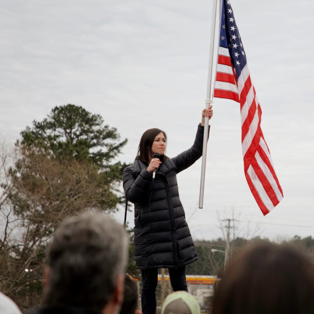Katie Britt waving flag Alabama News