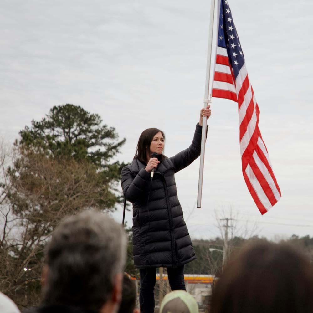 Katie Britt waving flag Alabama News