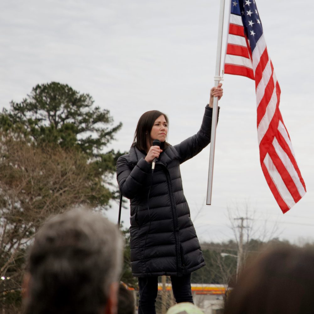 Katie Britt waving flag Alabama News