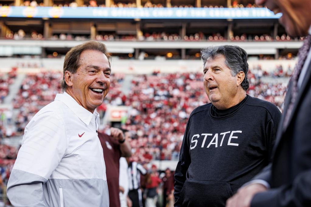 Nick Saban and Mike Leach Photo by Mississippi State Athletics