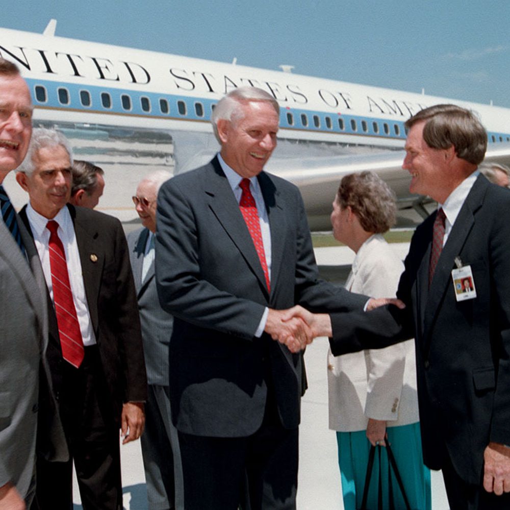 President George Bush and Alabama Governor Guy Hunt are greeted by Marshalls sixth Center Director Thomas J Lee at at Redstone Arsenal Alabama News