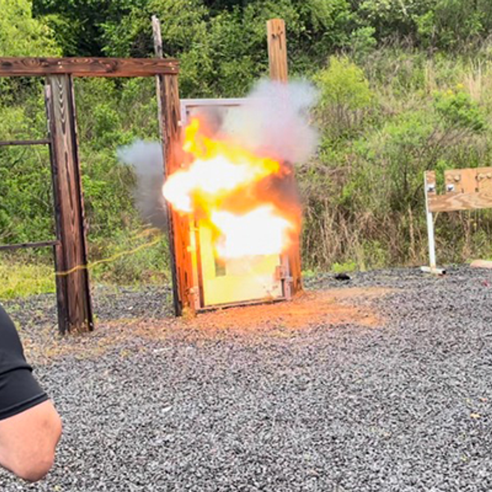 Trainees watch as CRG trainers demonstrate how to use an explosive breaching device Alabama News