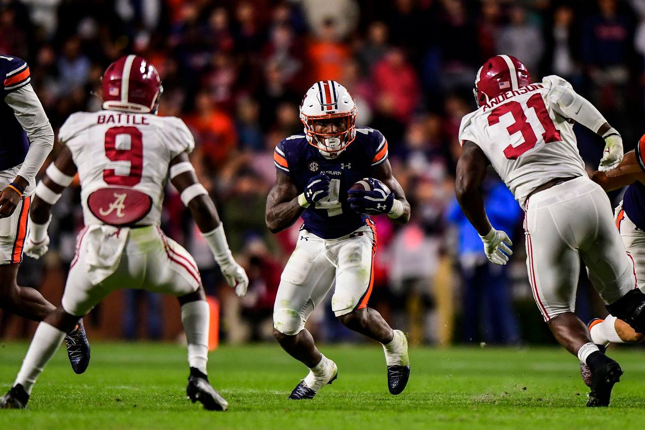 Tank Bigsby (4) and Auburn travel to Tuscaloosa for this year's Iron Bowl, where they will meet the likes of Alabama's Jordan Battle (9) and Will Anderson (31). (Jacob Taylor/Auburn Athletics)Jacob Taylor/AU Athletics