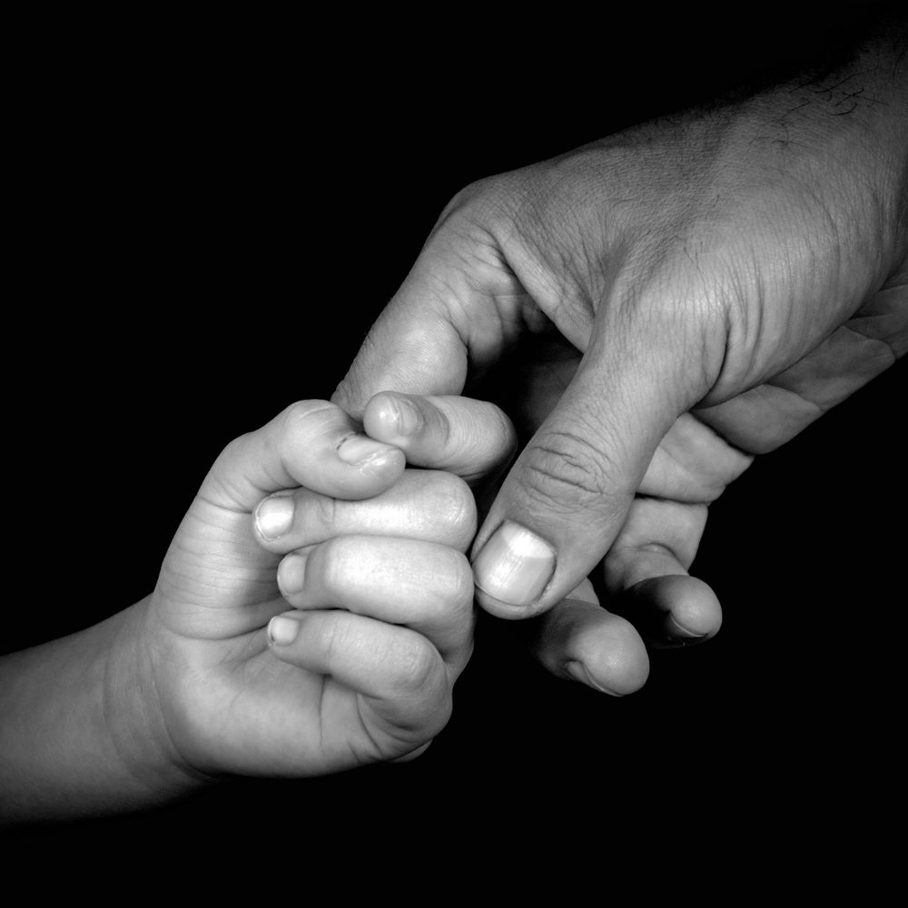 Alabama political news father child hand 2 Alabama News