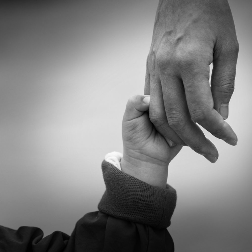 Alabama political news father child hand Alabama News