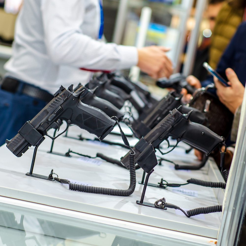 Gun Display Stands. Pistols for sale in the store. Alabama News