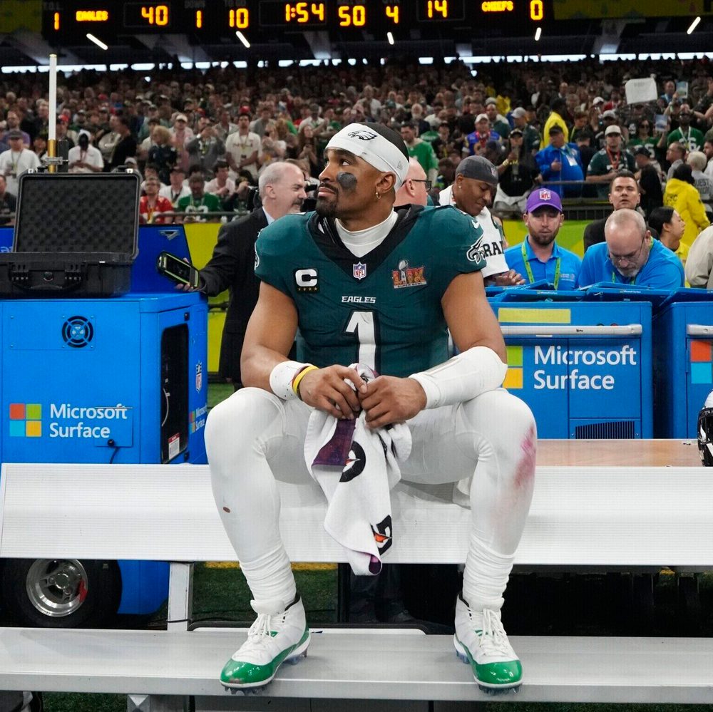 Philadelphia Eagles quarterback Jalen Hurts (1) watches from the bench during the second half of the NFL Super Bowl 59 football game against the Kansas City Chiefs, Sunday, Feb. 9, 2025, in New Orleans. (AP Photo/Brynn Anderson) Alabama News