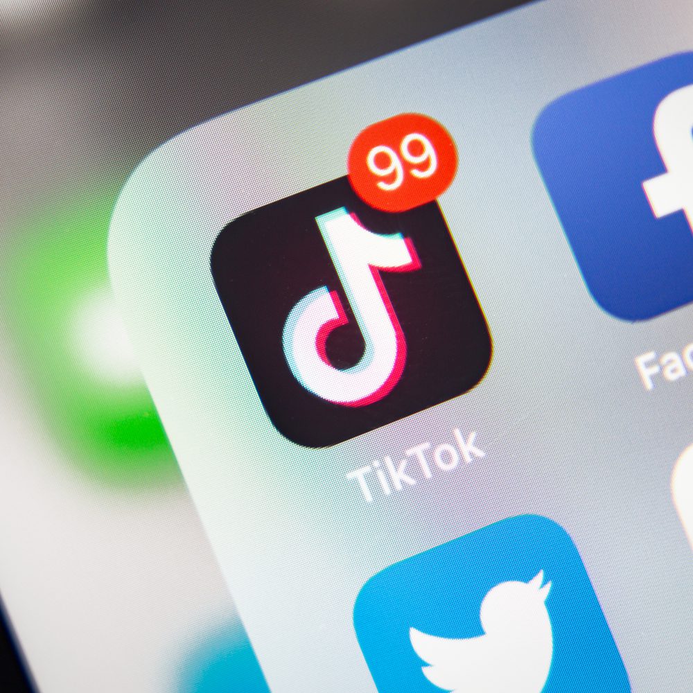 TikTok and Facebook application on screen Apple iPhone XR Alabama News