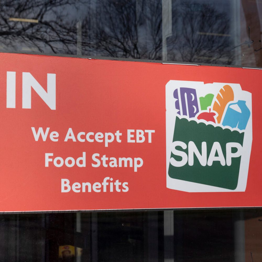 SNAP and EBT Accepted here sign. SNAP and Food Stamps provide nutrition benefits to supplement the budgets of disadvantaged families. stock photo Alabama News
