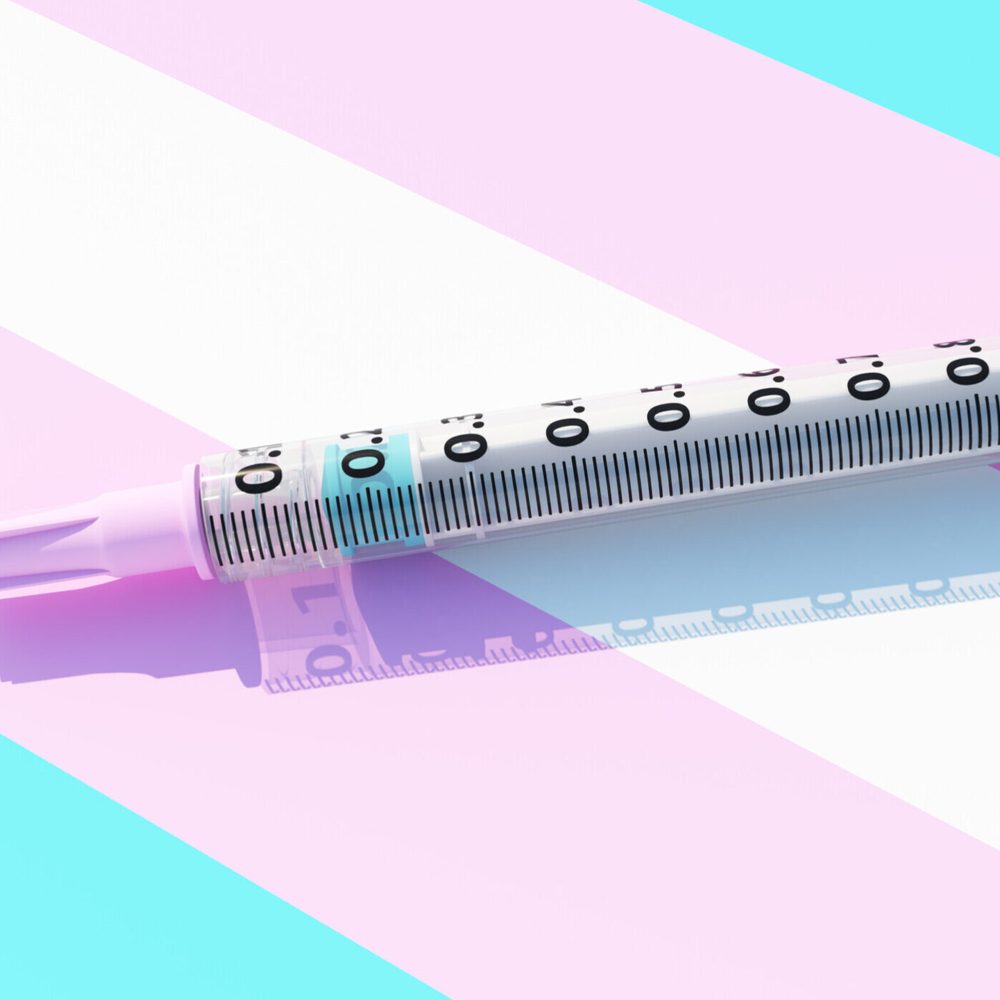 Transgender Flag Syringe Medical Healthcare Pink Blue White Trans Cross Sex Hormones stock photo Alabama News