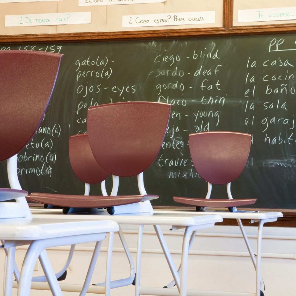 Classroom and empty seats for spanish class stock photo Alabama News