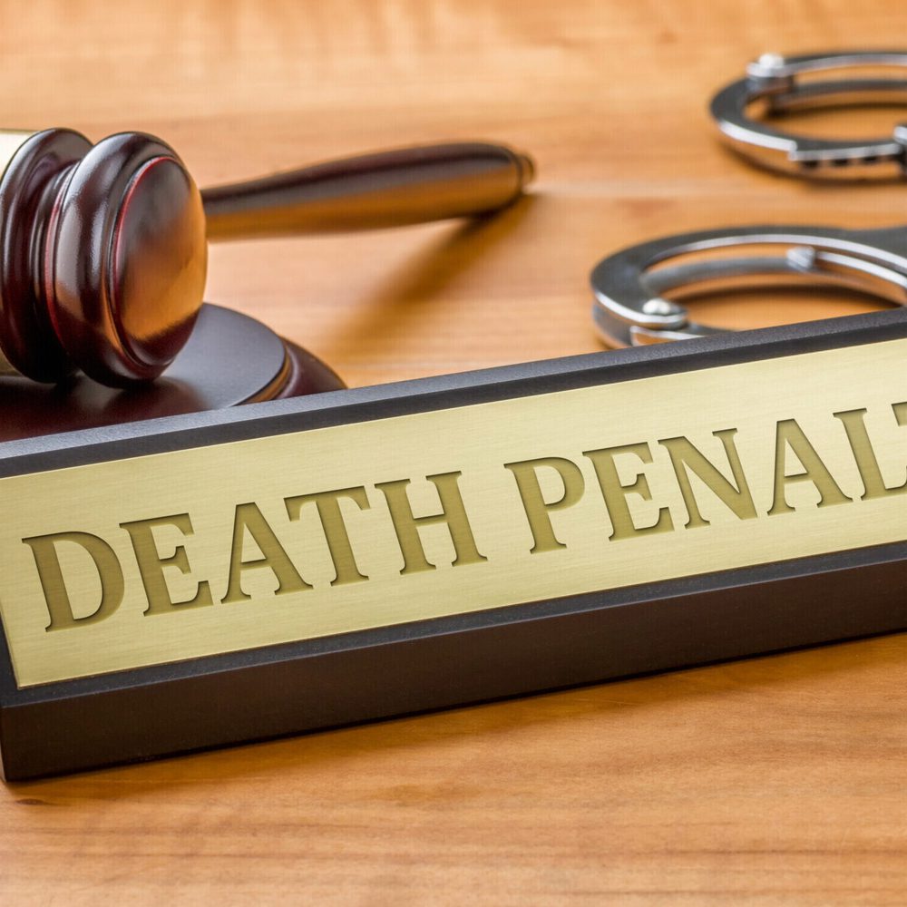A gavel and a name plate with the engraving Death Penalty Alabama News