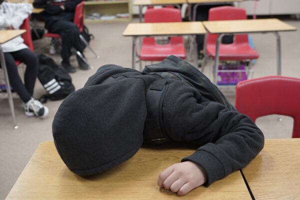 School children desk education student mental health stressed class by Damian Dovarganes AP Photo